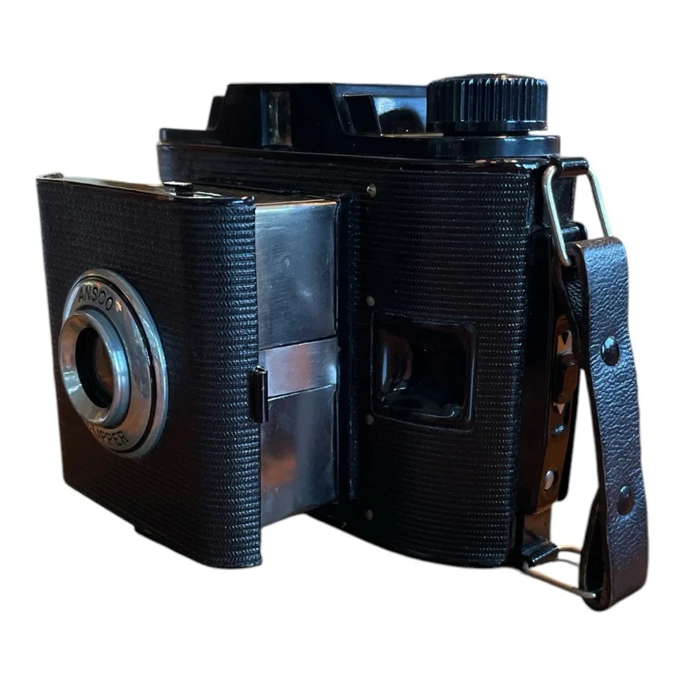 Black Film Photography Camera with Textured Body and Circular Lens UNTESTED